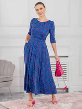 Load image into Gallery viewer, Cobalt Blue dress from Jolie Moi with pops of hot pink leopard print. Soft stretchy fabric - no zips. Round boat neckline, short sleeves to the elbow. Maxi length. Ruching at the waist and finished perfectly with pockets. 

